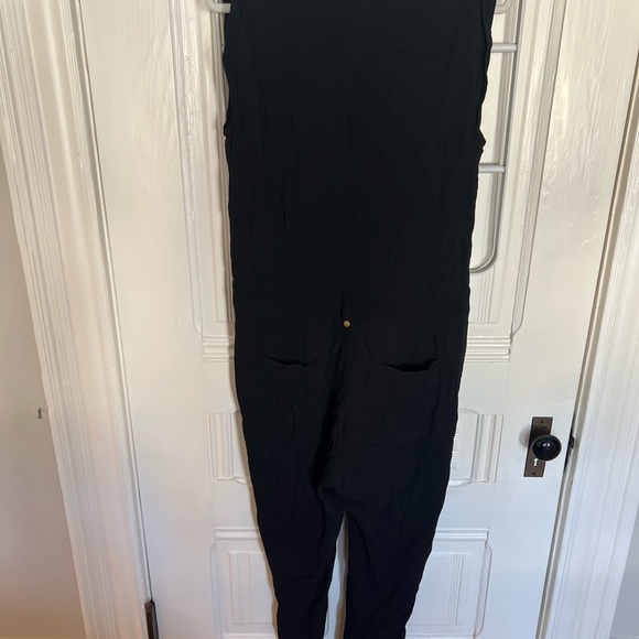 Black jumpsuit from Anthropologie with suit-like design - Picture 3 of 5